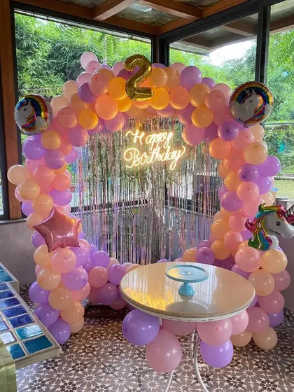 A clear, straight-on shot of the unicorn ring backdrop.