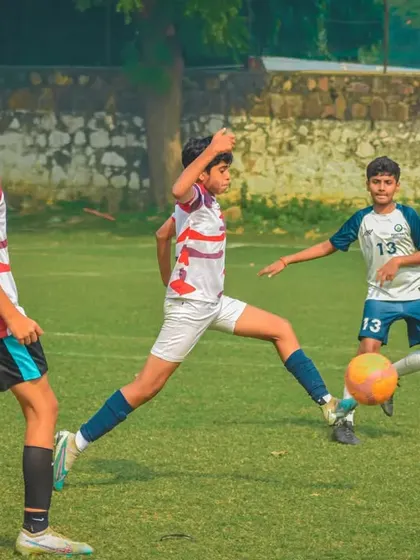A player strikes the ball with perfect technique.