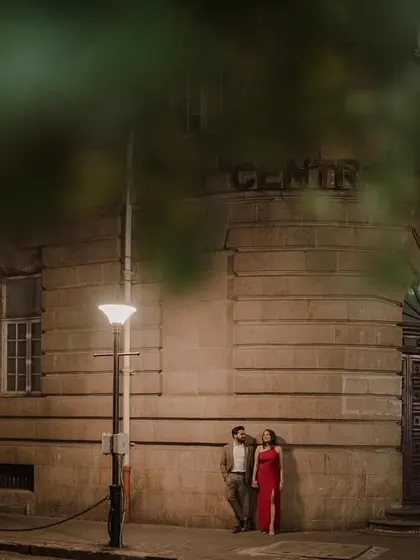 An atmospheric night shot, using natural framing from leaves to create a sense of intimacy.