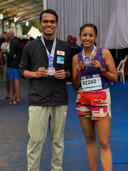Holding our medals after a successful race. My coaching partner and I both secured first place in our respective categories at the Apla Pune Marathon.