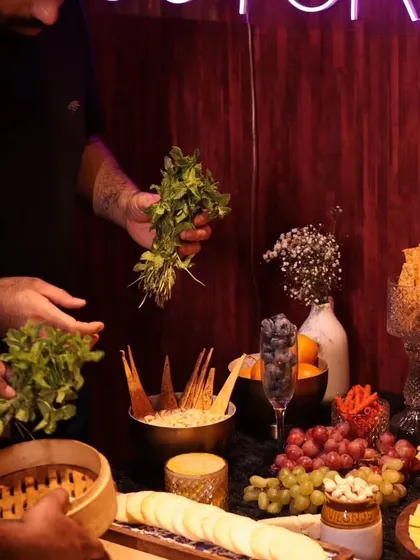 Our team members preparing the grazing table at the AOM Couture influencer event. We were thrilled to partner with the fabulous fashion brand for their special evening.
