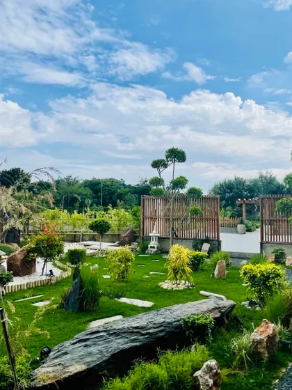 A farmhouse garden never fails to amaze. Its beauty evolves year after year, showing different shades at different times of the day and looking unique with every passing season. This Zen inspired design is a testament to that.