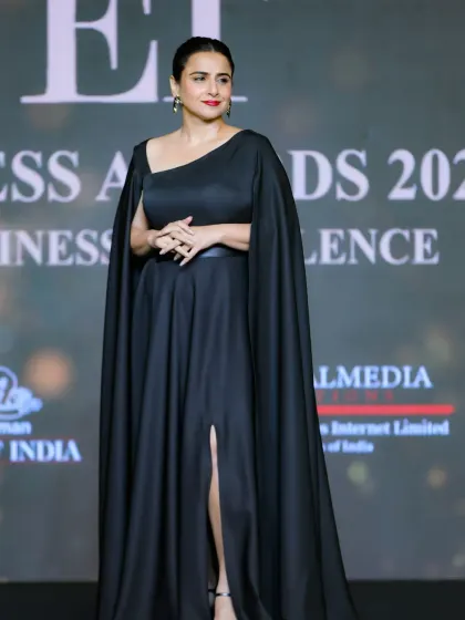 This poised, full-length shot of Vidya Balan at the ET Business Awards highlights the formal attire and elegant atmosphere of the gala, demonstrating our skill in fashion and event photography.