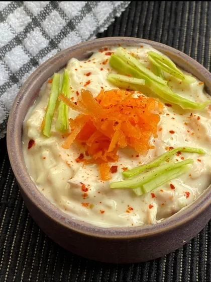 My homemade coleslaw is a perfect summer side dish. I use Greek yogurt instead of mayonnaise and pack it with shredded cabbage, carrots, and green onions for a refreshing, crunchy, and healthy salad.