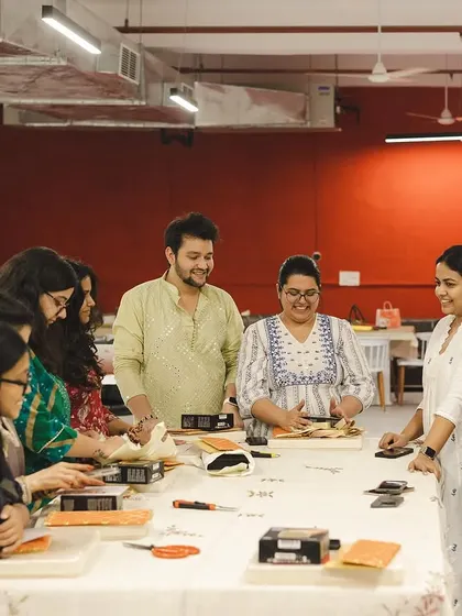 The team gathered around the packing table. These moments of collaboration and shared effort are the backbone of our business.