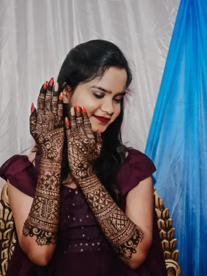 Seeing my bride happy with her engagement mehendi is the best feeling. This design covers both arms with dense, traditional patterns, perfect for such a special ceremony.