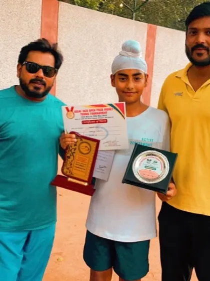 Another shot celebrating Tegveer Singh's achievement at the AITA Super Series. Our coaching team provides personalized guidance to help players succeed in high-pressure tournaments.