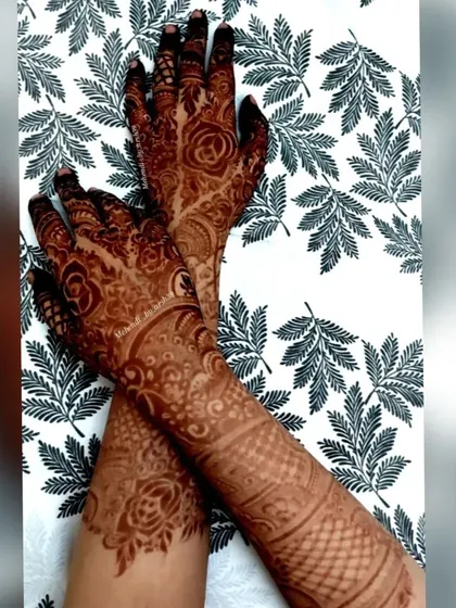 A full view of a floral bridal design on a patterned background.