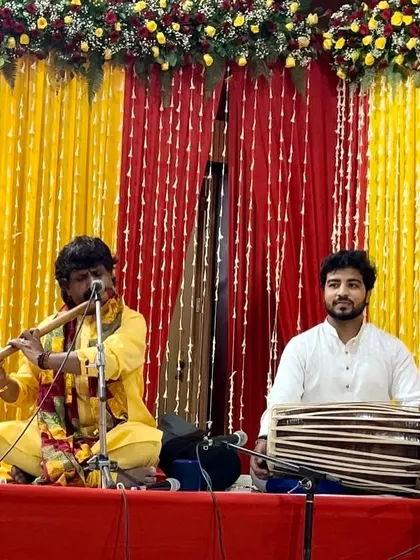 Sharing the stage with the legendary maestro Pt. Ajay Prasanna during a live concert. Accompanying a master of the flute is always a profound learning experience.
