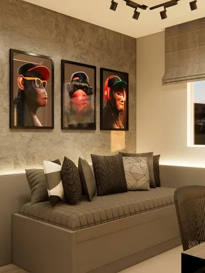 A close-up of the daybed area, with quirky modern art, showing how a home office can still have personality.