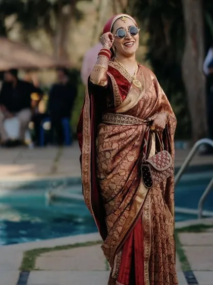 Saree draping is an art, and I love helping my clients find the perfect style. This modern, chic drape was for a poolside event, showing how we can adapt traditional wear to be both elegant and fashion-forward.