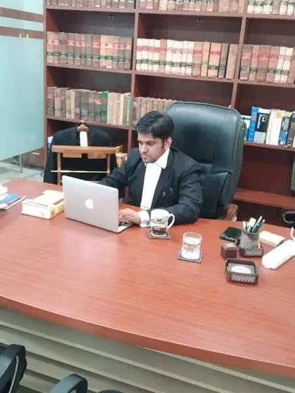 Working late in my new office. This profession demands constant dedication and hard work.