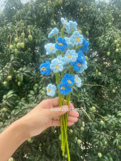 A custom bouquet of blue forget-me-nots in two shades.
