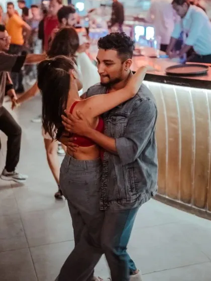 A sweet moment captured while social dancing. Even in a crowded room, it feels like it's just the two of us.