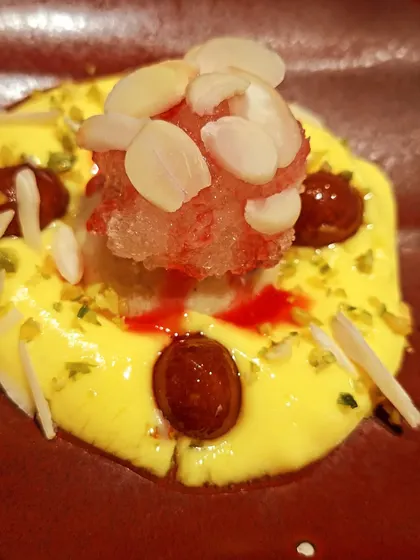 A modern take on a traditional Indian dessert at Loya, featuring multiple textures and flavors.