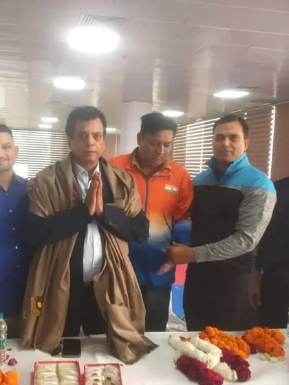 Being honored with a shawl by the organizers of the Delhi state selection trials.