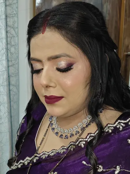 A close-up of the purple glittery eye makeup. I love how the shimmer catches the light and adds so much dimension.