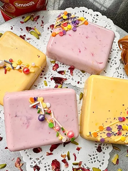 Introducing our Rakhi specials: 'Biscofi-licious' and 'Pista-licious' chocolate bars. These unique, colorful treats are filled with deliciousness and come in beautiful gift packs.