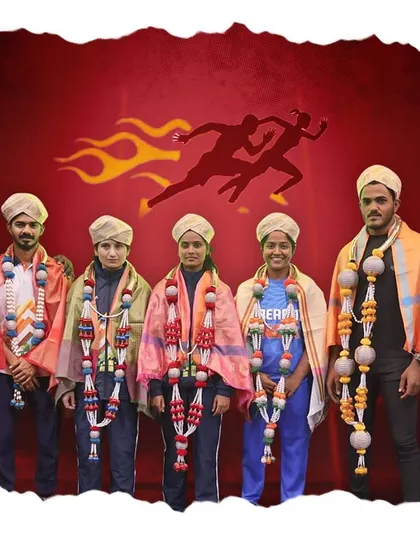 Our champions honored in traditional style, celebrating their achievements with garlands and turbans.