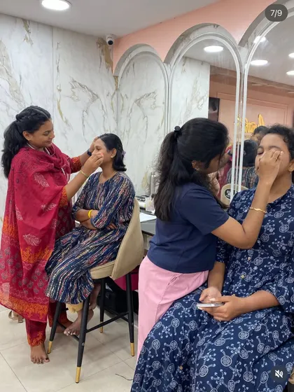 Students in my professional batch practicing the techniques I've just demonstrated. This hands-on experience is essential for building the confidence to work on future clients.