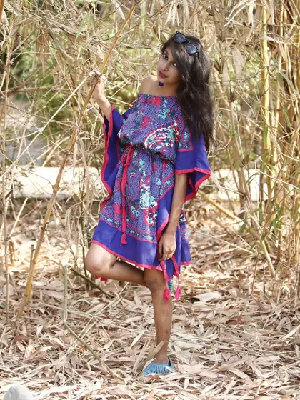 Another look from my archives, this time a vibrant blue kaftan dress shot against a backdrop of dry bamboo.