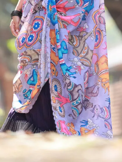 A detail shot of the beautifully printed dupatta from our admiral blue langa voni series. This highlights the unique, artistic fabric of the outfit.