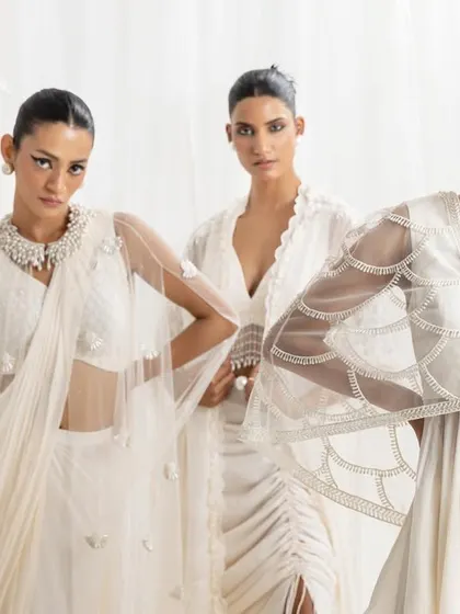 Another group shot from the "Rumi" collection, showing the harmony of different ivory outfits. This is key for creating a cohesive aesthetic for the entire bridal party.