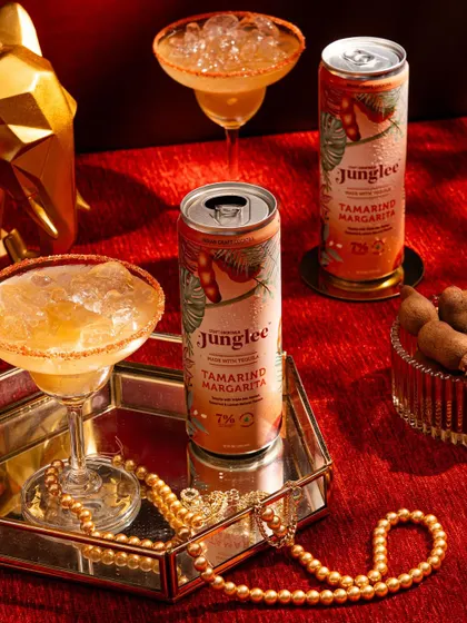 A sophisticated shot of tamarind margaritas, styled with traditional jewelry for an elegant, festive look.