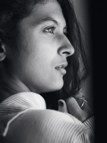 A thoughtful, side-glancing portrait. The soft lighting and simple styling create a timeless and intimate feel, showcasing my range in expressive modeling.