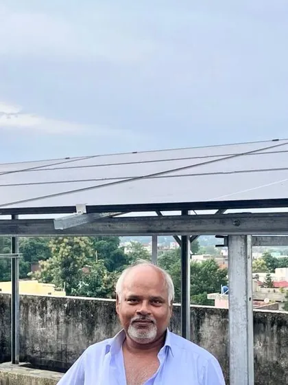 Another shot of the happy customer in Ranchi with his new rooftop solar installation. His smile says it all: energy independence brings peace of mind.