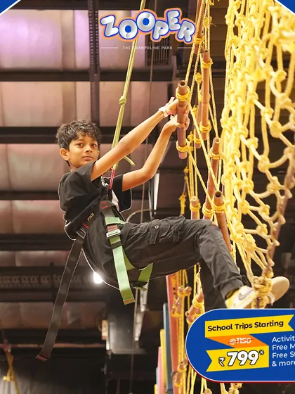 Conquering the net climb is a great challenge for students. It builds confidence and is a thrilling part of the adventure course.