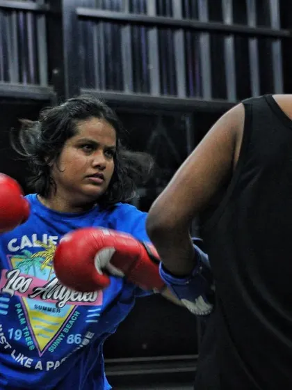 This is about courage. A student steps in and throws a combination against a bigger opponent, learning to close the distance and fight smart.
