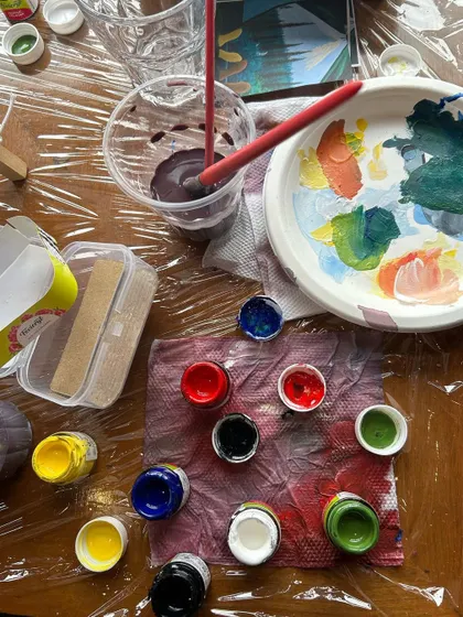 The beautiful, colorful mess of a paint palette after a session. This is what creativity looks like.