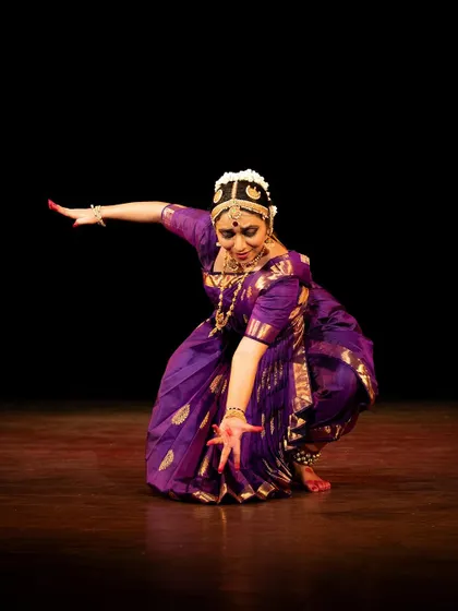 Meera Krishna in a pose of offering, her performance a blend of technical skill and deep feeling.
