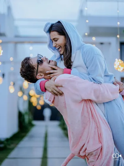 A duplicate of the onesie dance dip, a perfect capture of laughter and love.