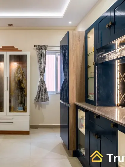 A duplicate of image 159, showing the dining area with the blue crockery unit and white pooja unit.