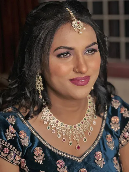 Another angle of Simran's engagement look. The makeup is glamorous and designed to make a statement, perfect for a memorable evening.