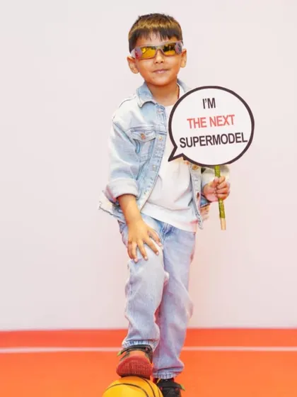 We love the confidence. This young man is ready to take on the fashion world.