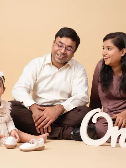 The first birthday is a celebration for the whole family. A classic family portrait marking this special milestone.