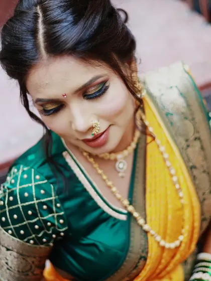 A gorgeous Maharashtrian bride. I loved creating this look with the traditional nauvari saree, nath, and a beautiful hairstyle featuring fresh yellow flowers.