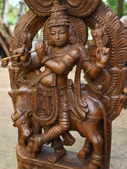 A 36-inch Prabhavali Pooja Murthi of Krishna, with four arms and playing the flute. This is a powerful form for worship, combining Krishna's divine and martial aspects.