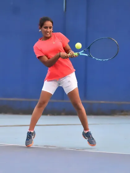 A dynamic shot of me hitting a forehand on the move. Agility and the ability to hit powerful shots while running are critical skills for any competitive tennis player.