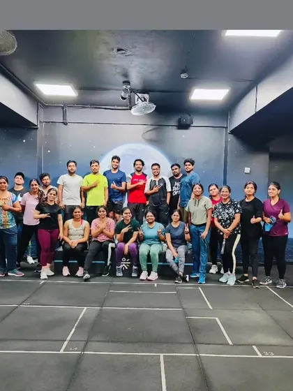 The heart and soul of my classes. Each photo captures a unique moment with my incredible community after a sweaty, joyful session. This is our shared victory lap.