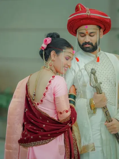 A tender moment between the bride and groom. The bride's expression of love and trust is beautifully captured in this shot.