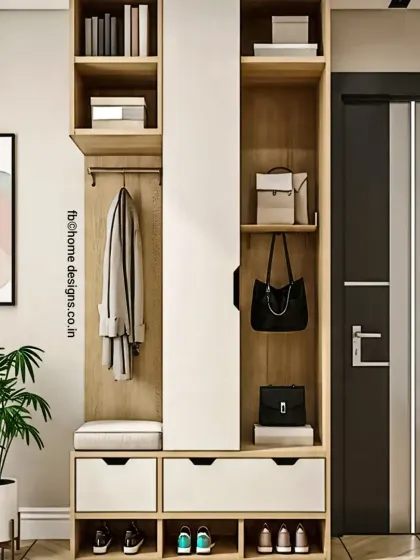 An all-in-one entryway organizer. This unit features shoe storage at the bottom, a seating bench, coat hooks, and overhead shelves for bags and other essentials, keeping the entrance tidy.
