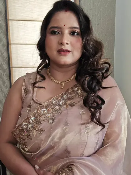 The complete party look. The makeup is glamorous but not heavy, allowing her to feel comfortable and beautiful.