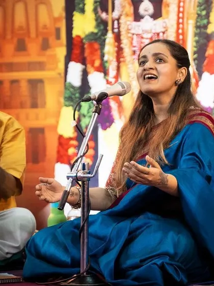A moment of musical dialogue with my tanpura player during the Ramotsava concert. The drone of the tanpura is the foundation upon which all our melodies are built.