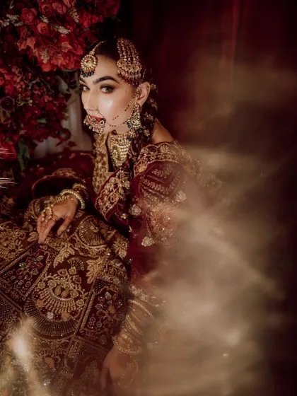 Our "Chand ka Tukda" bridal campaign. This image captures a dreamy, artistic portrait of our model, showcasing a regal and traditional bridal style.