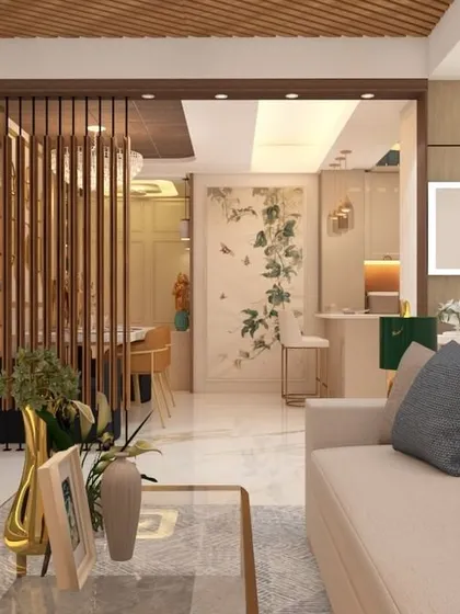 A closer look at our open-plan living and dining area, showcasing the seamless transition between the two zones. The design uses consistent flooring and ceiling treatments to unify the space, while furniture arrangement defines the distinct functional areas.