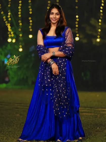 A full-length shot of actress Sapthami Gowda posing in a beautiful blue gown. This photo shows my skill in creating elegant portraits for celebrities and events.